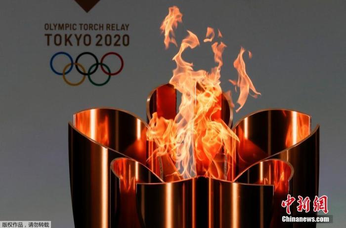 资料图：当地时间3月25日，东京奥运会圣火点燃。
